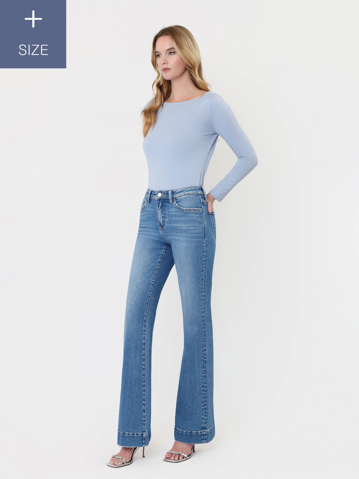 A CURVY HIGH RISE HEM RELAXED FLARE