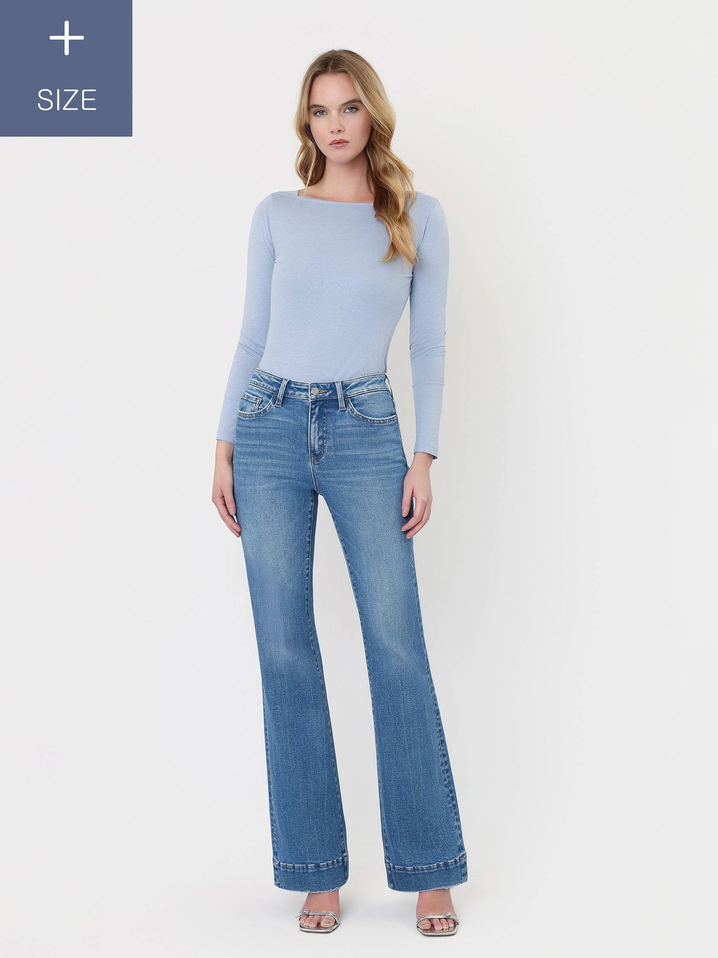 A CURVY HIGH RISE HEM RELAXED FLARE