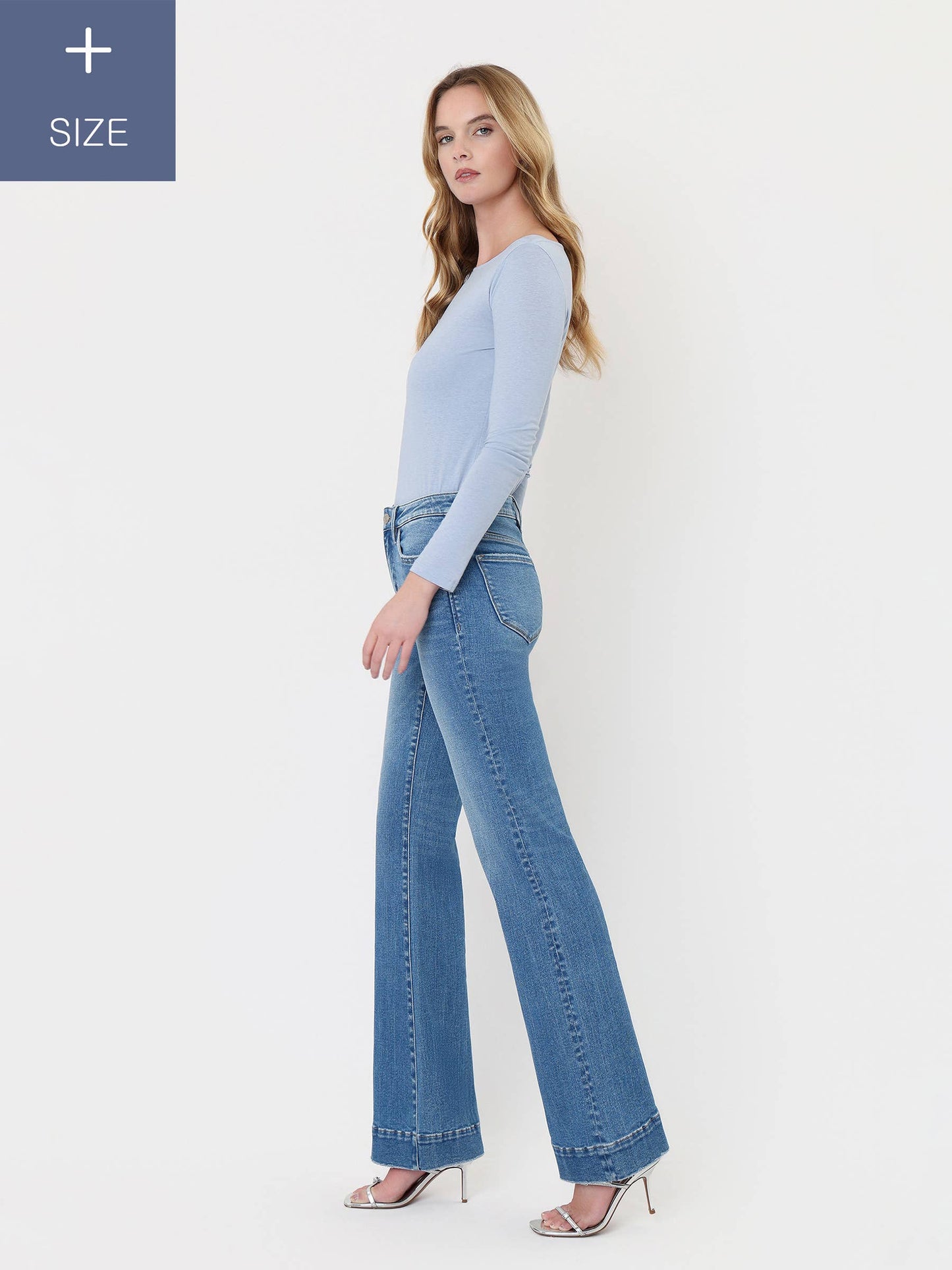 A CURVY HIGH RISE HEM RELAXED FLARE