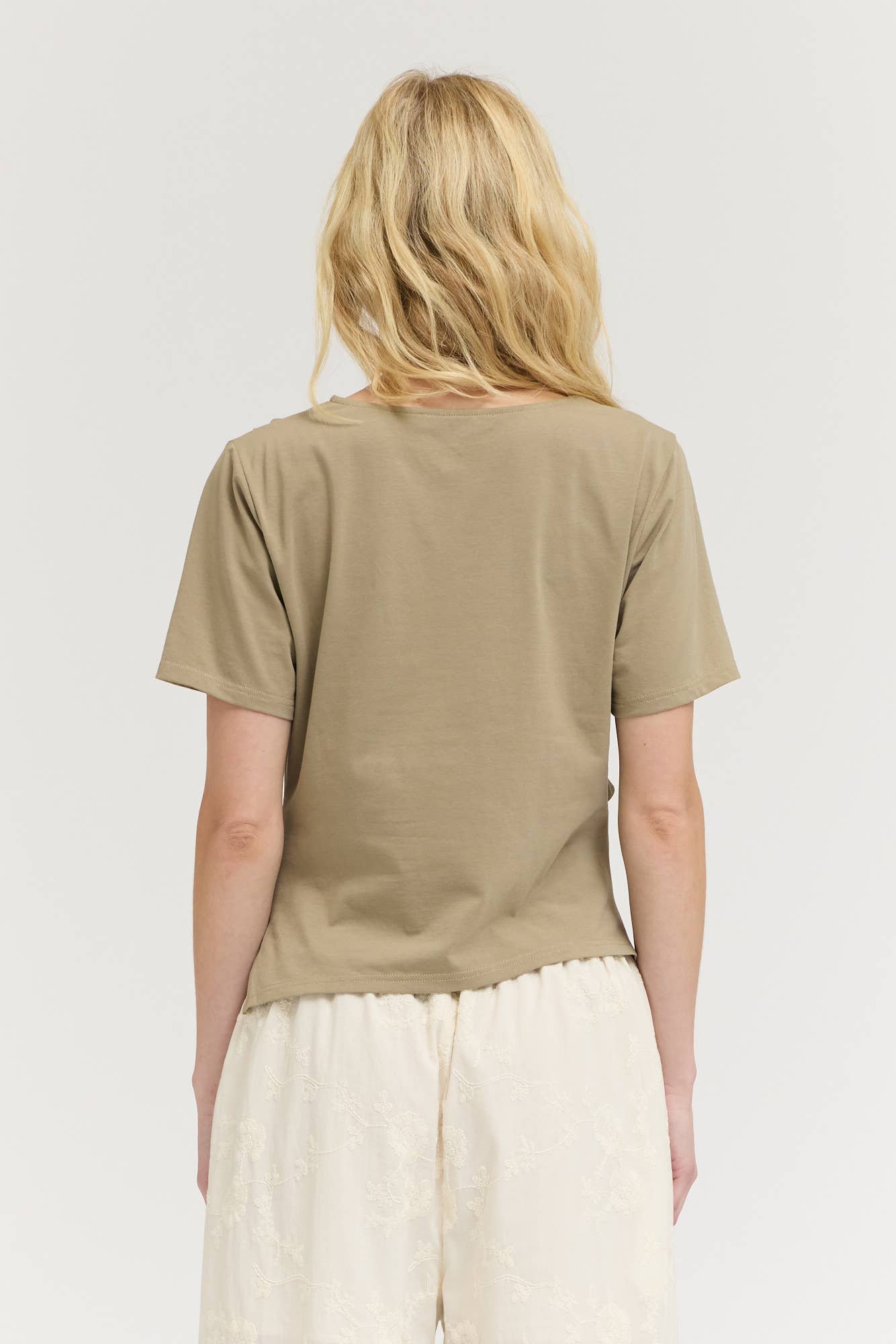 AN ASYMMETRIC JERSEY TEE