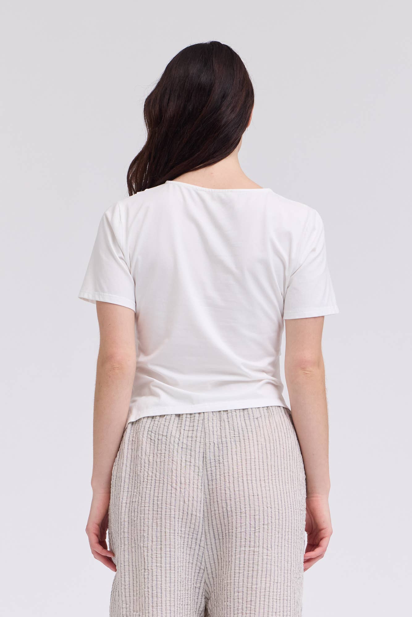 AN ASYMMETRIC JERSEY TEE