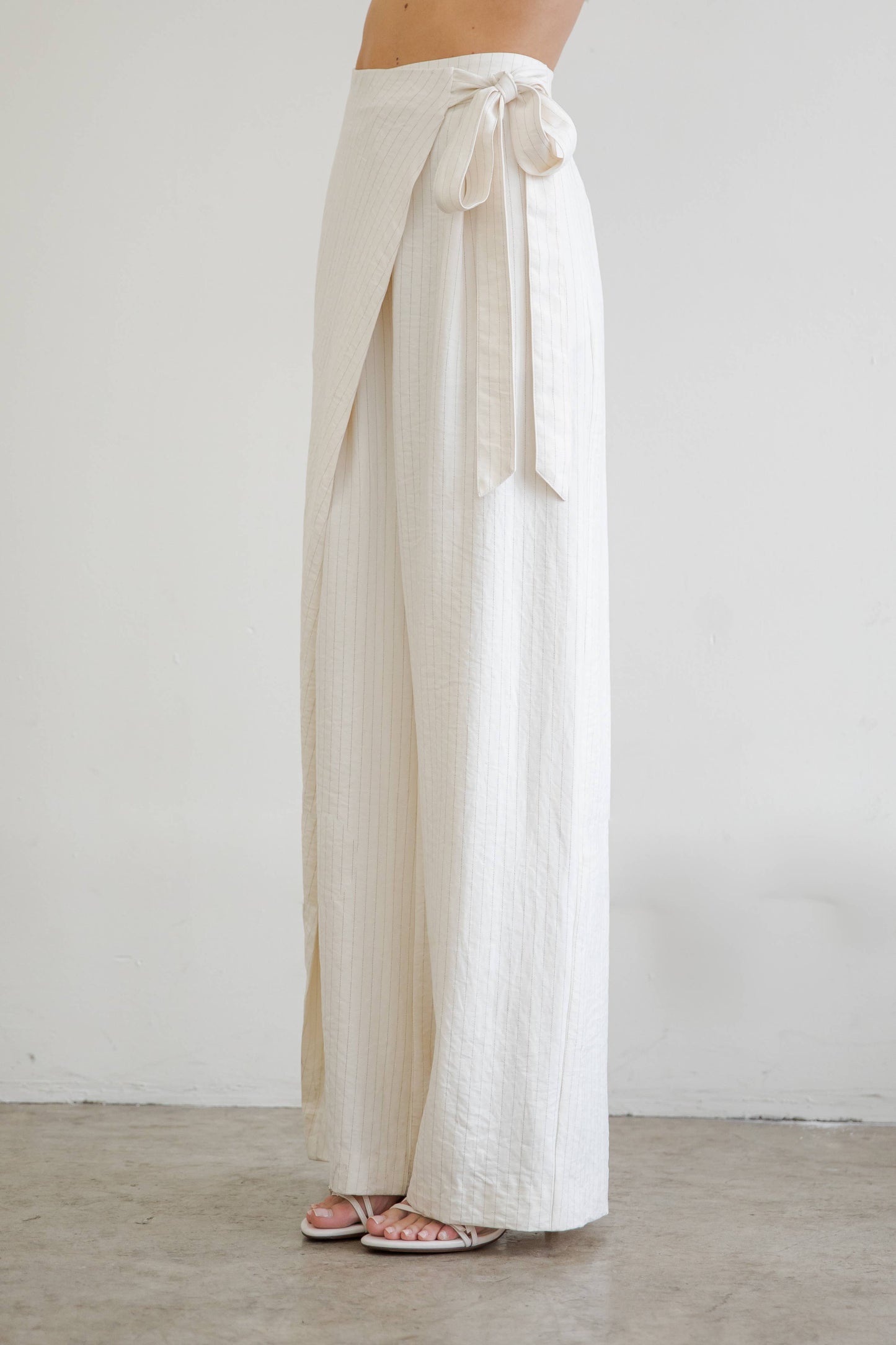 AN OVERLAPPING STRAIGHT LEG TROUSERS