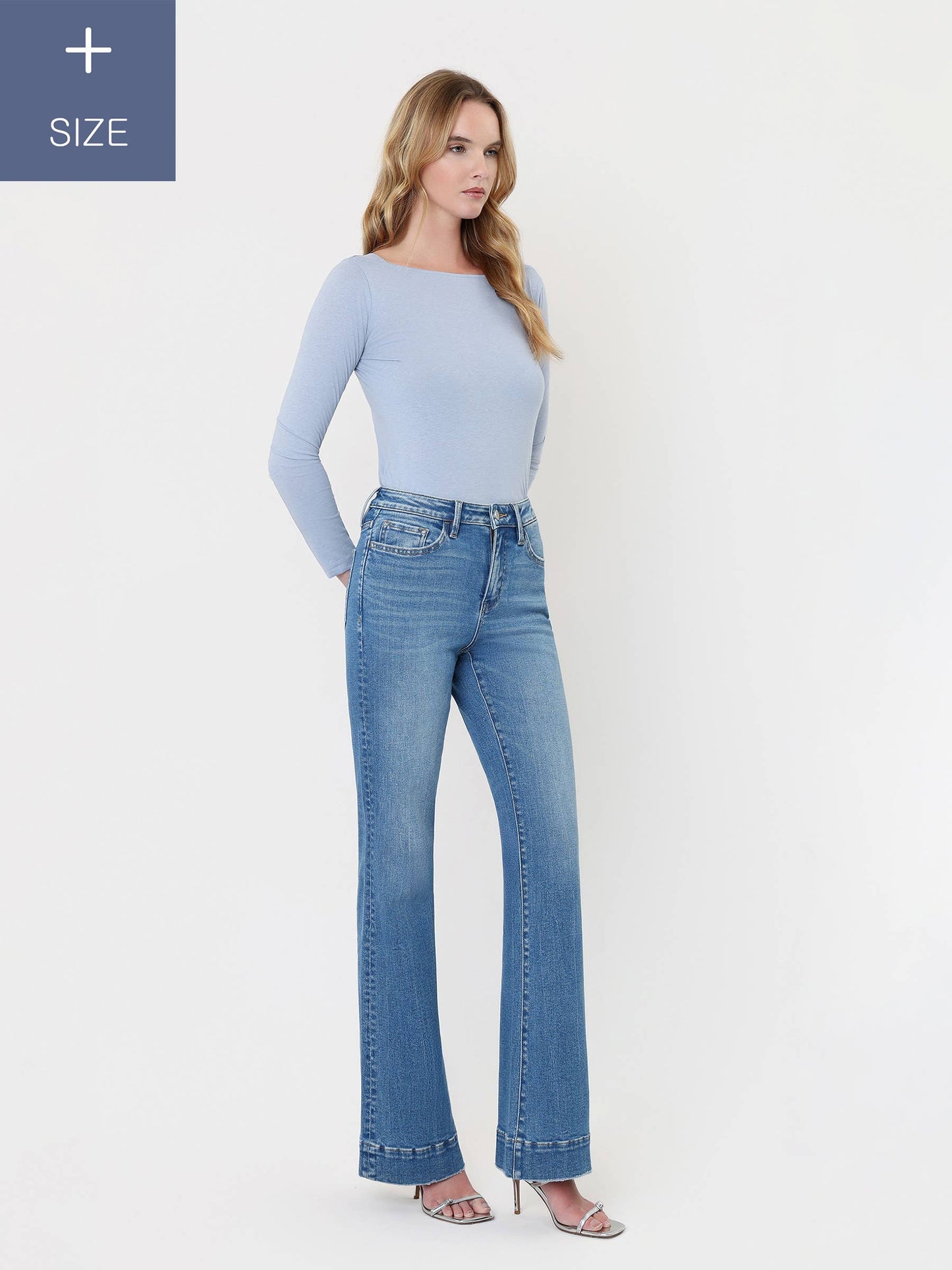 A CURVY HIGH RISE HEM RELAXED FLARE