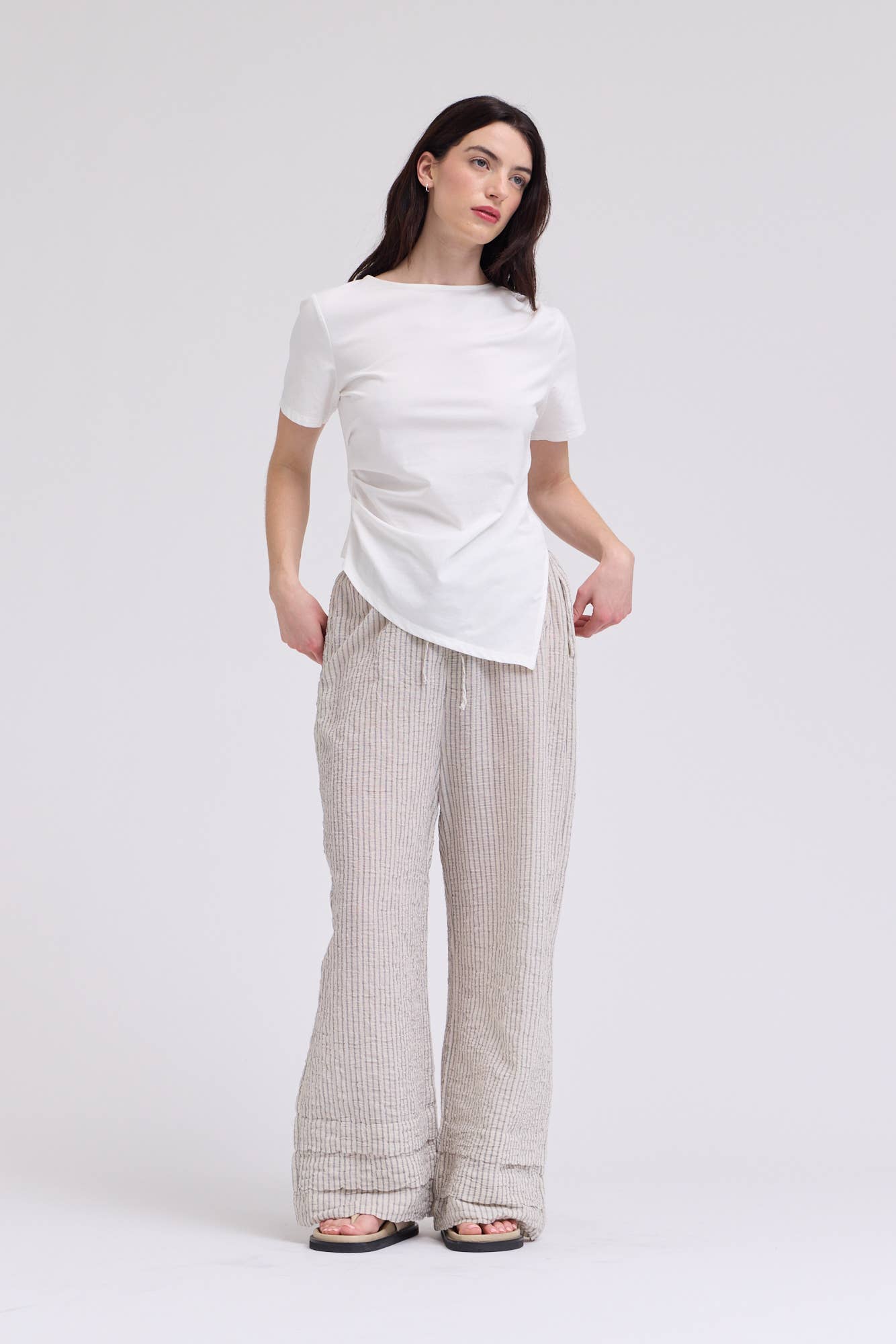 AN ASYMMETRIC JERSEY TEE